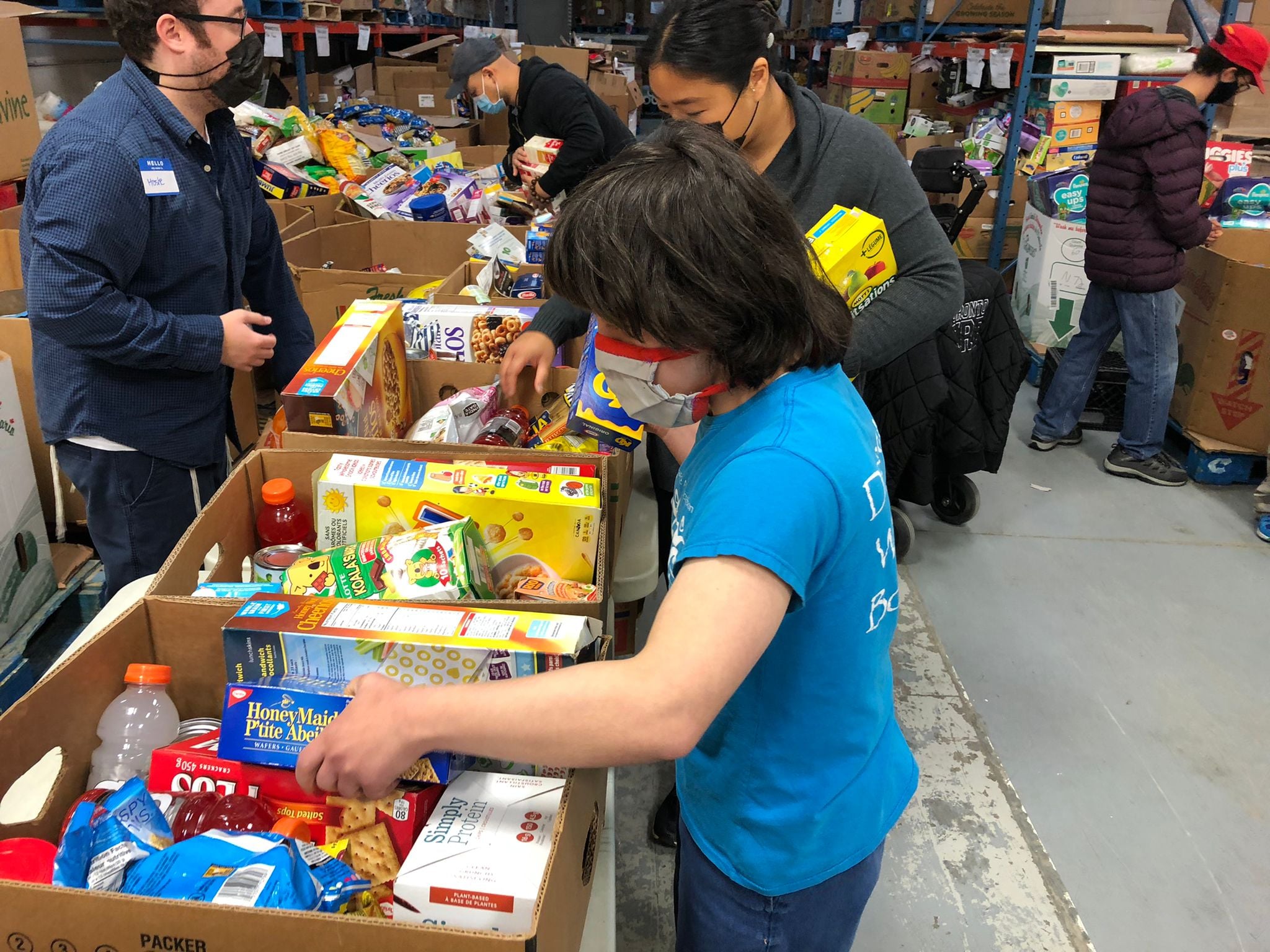 Rita volunteering at the food bank